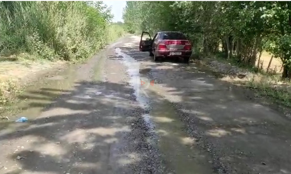 Каналга айланган Жийде айылынын жолу
