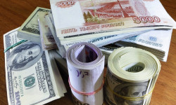 Сомдун соодасы: Орус акчасы бир аз көтөрүлдү